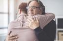 A generic photo of grown up son and father hugging. See PA Feature ADVICE Ask Fiona. Picture credit should read: iStock/PA. WARNING: This picture must only be used to accompany PA Feature ADVICE Ask Fiona..