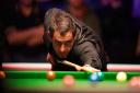Ronnie O’Sullivan in action against Noppon Saengkham at the Cazoo UK Championship at the York Barbican. Picture: Martin Rickett/PA Wire