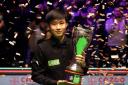 Zhao Xintong lifts the trophy after winning the final of the Cazoo UK Championship at the York Barbican. Picture: Richard Sellers/PA Wire