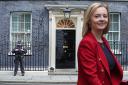 Photos via PA show 10 Downing Street and foreign secretary Liz Truss.