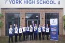 A flashback to Rod Sims celebrating York High School's good Ofsted rating with pupils