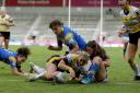 York Valkyrie hooker Sinead Peach scores a try against Leeds Rhinos in the Betfred Women's Super League Grand Final.