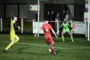 Selby's Jamie Danby bears down on goal against Parkgate.