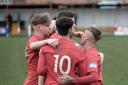 Selby Town players celebrate their 4-0 victory over Staveley Miners Welfare on Saturday.