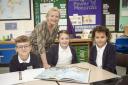 Bev Fletcher, who is set to take early retirement from being head at Brotherton and Byram Primary Academy, is pictured with pupils, from left, Noah, Lexi and Willow