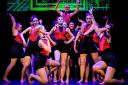 Young performers from Stagecoach York showcasing a routine from  Moulin Rouge at  the Shaftesbury Theatre in London's West End