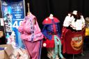 The trio of Theatre Royal panto costumes that are on sale to the highest bidder today