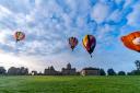 Balloons over Castle Howard during the Yorkshire Balloon Fiesta