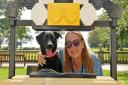 Daisy the labrador with Sharron Wilson, events and activities officer, on one of the BRICKLIVE Animal Paradise exhibition pieces at Sewerby Hall and Gardens