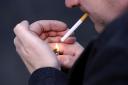 A general view of a man smoking a cigarette. Our columnist offers advice on how to stop giving in to urges