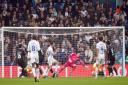 Leeds United's Crysencio Summerville scores his side's fourth goal against Huddersfield Town.