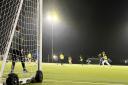 A view of the match from behind the blue team's goal