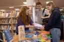 Outreach librarian Claire Thompson (left), shares North Yorkshire Libraries’ free Self-Care Toolkit with interested teenagers.