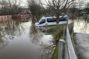 A van submerged in flooded St George's Field car park on Monday