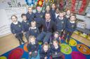 Dave Card and children at Camblesforth Community Primary Academy, which has just been awarded a 'good' rating from Ofsted with 'outstanding' early years provision