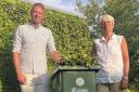 Lib Dem councillors Andrew Hollyer, left,  and Paula Widdowson with a green bin