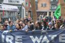 Protesters march over Ouse Bridge and along High Ousegate