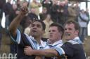 DAD: Alex Godfrey, left, celebrates his match-winning try as York City Knights beat Featherstone in a memorable 2004 Challenge Cup tie, despite having played most of the game a man down
