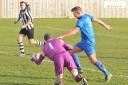 Pickering Town (blue) v Athercley Recreation (black & white). Pictured is Pickering's Calum Ward in action. Picture David Harrison. (56496119)