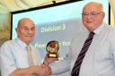PRIZE: Veteran Geoff Deighton from Retreat II receives the Division 3 Player of The Year Award from Mike Wellock. Picture: David Harrison.
