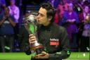 Ronnie O'Sullivan drew level in the snooker record books with Steve Davis and Stephen Hendry on a night to savour in York