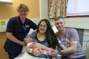 THANK YOU: Head of Midwifery Liz Ross with Sarah and Edward Alderson and baby Rose