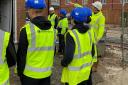 York College bricklaying students being shown round Persimmon's Bootham Crescent site