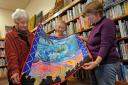 Annie Parkinson, Judith Clarke and Roberta Harte admire Judith’s quilt ‘Rohilla’ which depicts the story of the First World War hospital ship lost off Whitby
