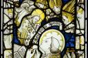 Part of the restored medieval stained glass window at All Saints Church in North Street