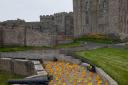 146 yellow wellies are at Bamburgh Castle to mark 146,000 lives saved by the RNLI