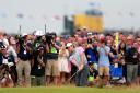 CAMERA, LIGHTS, ACTION: Rory McIlroy being filmed on his way to last year’s triumph in The Open at Royal Liverpool, but in two years’ time live coverage will be confined to Sky