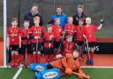City of York Hockey Club Under-10s Boys celebrate winning the Yorkshire and North East In2 Hockey title.