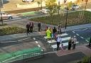 Andy D’Agorne and fellow Green candidate Dave Taylor, in the hat, look over the new road layout outside Fishergate Primary School, York, where a 20mph speed limit now applies