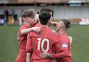 Selby Town players celebrate their 4-0 victory over Staveley Miners Welfare on Saturday.