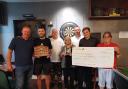 Alan Shipley's widow Anita and grandson Thomas handed over the cheque to the British Heart Foundation at Severus Social Club