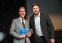 Sid Gornall being presented the Charity Fundraiser of the Year award by Liam Hattee from Delta Hotels by Marriot