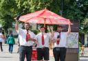 TIME TO PARTY … CitySightseeing York team members (from left) Morgan Swift, Joshua Dobson Fisher and James Burns enjoy a rare burst of sunshine as they celebrate winning tourism agency VisitEngland’s coveted Yorkshire’s Best Told Story title