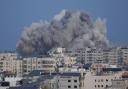 Smoke rises following an Israeli airstrike in Gaza City, Thursday, Oct. 12, 2023