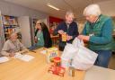North Yorkshire Council’s member for the Pickering division, Cllr Joy Andrews, chats to volunteers to learn how donated food items are distributed to struggling members of the community