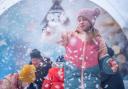 Festive fun in the snow globe at Williams Den Christmas Experience