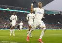 Leeds United kept the pressure on the Championship promotion places with a 3-0 triumph over Rotherham United.