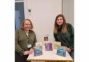 Stephanie Jardine (r) with her cards on sale in Haxby and Wigginton Library, with Lorraine Taylor, the library's manager