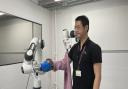 The 'two-handed' robot in the action of dressing