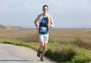 Jack McGuiness who is running marathons for the RSPCA