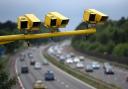 Speed cameras above a motorway