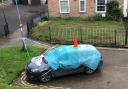 A grey Vauxhall car has been cordoned off in St Margaret’s Terrace, a cul de sac in the complex of council flats off Navigation Road close to Walmgate Bar