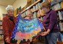 Annie Parkinson, Judith Clarke and Roberta Harte admire Judith’s quilt ‘Rohilla’ which depicts the story of the First World War hospital ship lost off Whitby