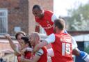 York City goal scorer Michael Coulson and team-mates celebrate during their victory over Newport County