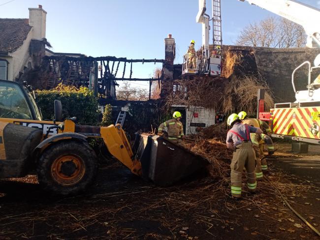 Firefighters at the scene of the fire at the Star Inn in Harome.  Picture: Karen Darley