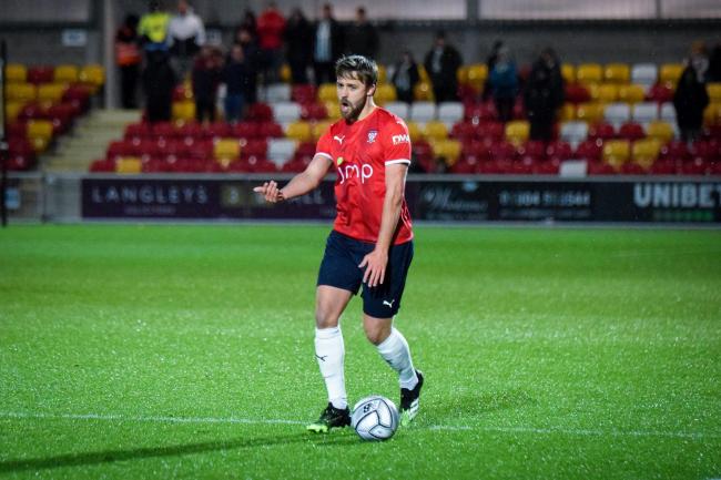 Scott Barrow looks for a team-mate during York City’s 1-0 FA Trophy win over Blyth Spartans at the weekend. Picture: Adam Davy